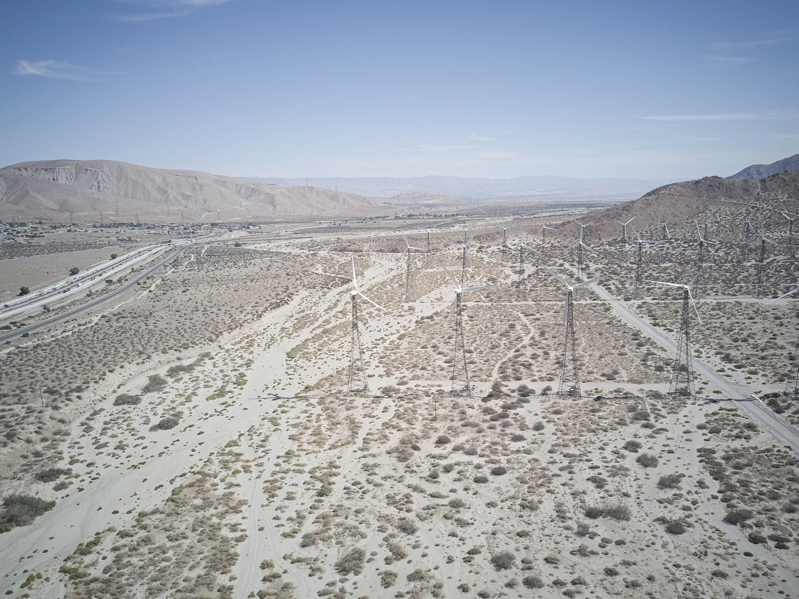 Wind turbines across an open landscape