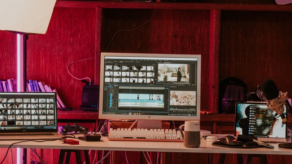 Media editing workstation with screens and microphones